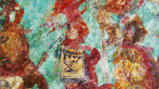 Room 2. The triumphant noblemen of Bonampak. Three captains of the winning army, dressed with capes and carrying weapons. All three wear headdresses of supernatural animals. The feather cape of the personage on the right side of the scene would indicate his higher rank.&nbsp;<span class='italic'>Photo Credit:&nbsp;Isabel Hawkins</span>