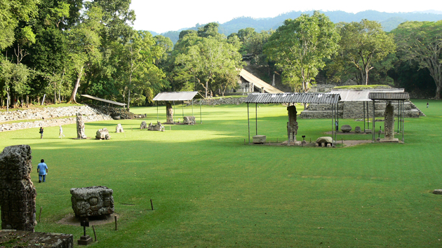 The Great Plaza and the Acropolis beyond comprise the main sections of Copán, where many structures were built by 18-Rabbit.  In addition to the restored center of the city, archaeologists have registered 3,450 ancient buildings. &nbsp;<span class='italic'>Photo Credit:&nbsp;Tepeu Roberto Poz Salanic</span>